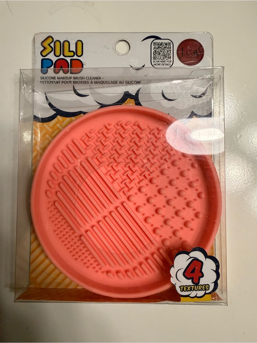 Makeup brush cleaning pad